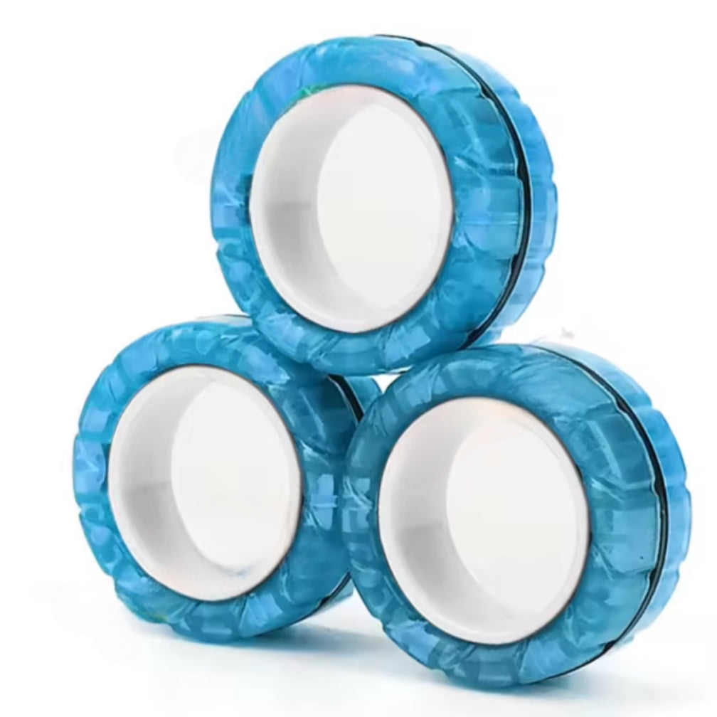 Magnetic spinner rings